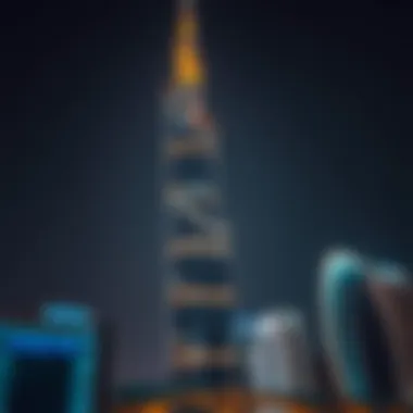Night view of Amal Tower illuminated, emphasizing its significance in Dubai's skyline