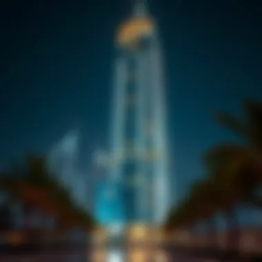 Night view of Palm Tower illuminated, symbolizing luxury living