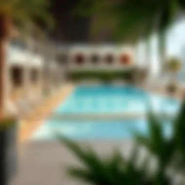 Relaxation Oasis: The Pool at Paramount Hotel and Residences A serene pool area with luxurious sun loungers and vibrant surroundings