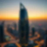 A stunning view of the Blue Tower against the Dubai skyline at sunset