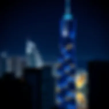 Night view of the Blue Tower illuminated, reflecting Dubai's vibrant nightlife